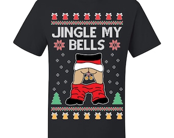 May include: Black t-shirt with a humorous Christmas design. The shirt features the text "JINGLE MY BELLS" above an illustration of a person's exposed backside with red pants and jingle bells. The design includes snowflakes, Christmas trees, and bells.
