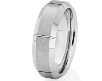 May include: A silver tungsten carbide wedding band with a brushed finish and a beveled edge.