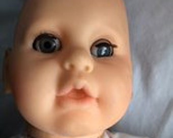 baby doll that opens and closes eyes