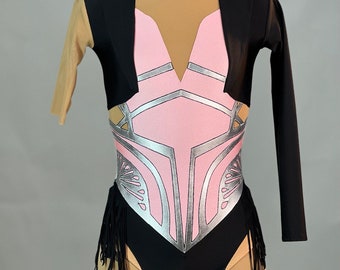 May include: A black leotard with a pink and silver design, a black bolero, and black fringe trim.