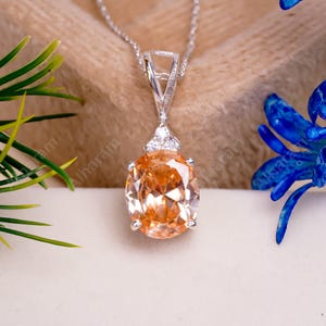 Padparadscha Sapphire Pendant: Peach Oval Gem, Sterling Silver