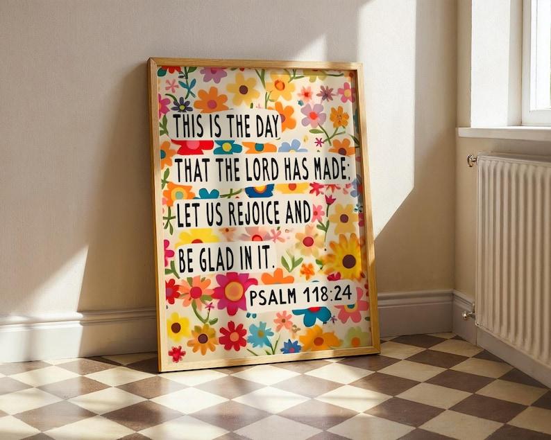 May include: A framed print with a floral design and a quote from Psalm 118:24. The quote reads "This is the day that the Lord has made: Let us rejoice and be glad in it."