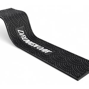 May include: Black rubber bar mat with a textured surface and the text "DRUNKEN OAK" in white.