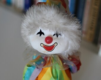 wind up clown doll