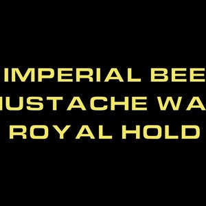 May include: A black background featuring the text IMPERIAL BEE MUSTACHE WAX ROYAL HOLD in a bold, sans-serif, light yellow font. The text is arranged in three centered lines, with the words stacked vertically to create a clear, readable label.