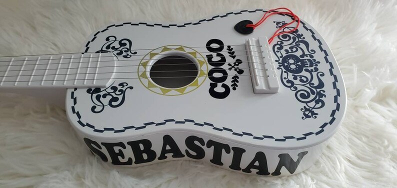 Coco guitar miguel guitar plastic a toy guitar | Etsy