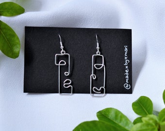 Boucles d'oreilles visage abstrait asymétriques de style naïf Picasso, boucles d'oreilles en fil d'argent, minimaliste, original, boucles d'oreilles tendance, boucles d'oreilles en fil d'or