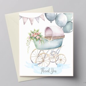May include: A watercolor illustration of a baby carriage with a pink canopy and blue wheels. The carriage is decorated with flowers and a blue ribbon. There are balloons in the background, and a banner with pink and blue flags. The text "Thank You" is written on the ribbon.