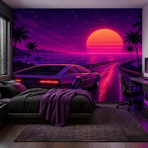 May include: A bedroom featuring a wall mural of a sports car on a coastal road at sunset with a large orange sun, purple sky, and palm trees. The room includes a bed with a dark purple blanket, a dark rug, and a desk with an office chair.