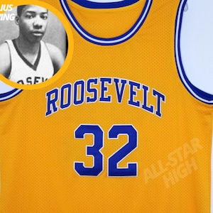 May include: A yellow basketball jersey with blue and white trim. The jersey has the word "ROOSEVELT" in blue letters across the chest and the number "32" in blue letters below it. The text "ALL-STAR HIGH" is printed in white on the bottom right side of the jersey.