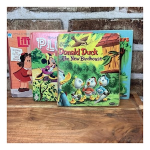 Children's Books, Disney Tell-a-Tale Series 4 books total , Collectible