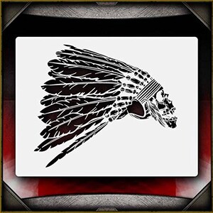 May include: Black and white stencil of a skull wearing a headdress with feathers. The skull is facing to the right and the feathers are flowing to the left.