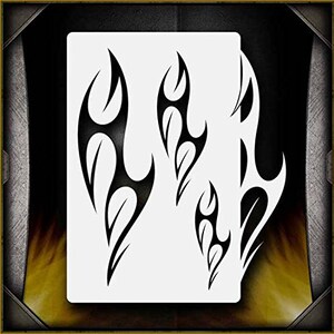May include: A stencil with four different flame designs. The flames are stylized and have a tribal look. The stencil is made of a durable material and is reusable.