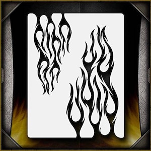 May include: A black and white stencil of two sets of stylized flames. The flames are intricate and detailed, with a sharp, angular design.