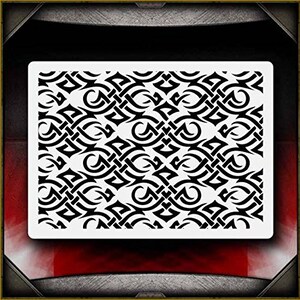 May include: Black and white stencil with a repeating pattern of interlocking swirls and geometric shapes. The design is intricate and detailed, creating a complex and visually appealing pattern.