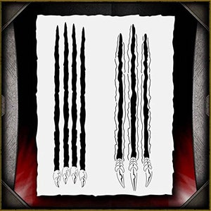 May include: A black and white stencil with two sets of claw marks. The stencil is designed for use with paint or other mediums to create a realistic claw mark effect.