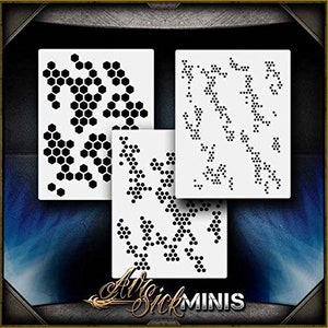 May include: Three white stencils with black geometric patterns. The stencils are for creating honeycomb, camouflage, and dot patterns.