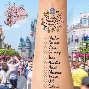 May include: A temporary tattoo with a circle design featuring the text "Drinking Around the World" and various Disney park icons. Below the circle, a list of countries is written with a Mickey Mouse head icon next to each country name: Mexico, Norway, China, Germany, Italy, America, Japan, Morocco, France, UK, Canada.