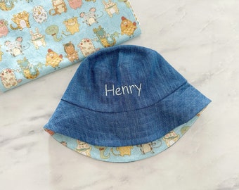 Personalised reversible denim Baby bucket hat, denim sun hat, baby boy hat, day care hat, football. print hat, name hat - cute animals