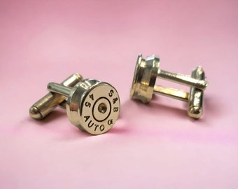 Handmade ammo cufflinks (.45 ACP). Elevate your charm with a touch of rugged elegance.