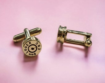 Handmade ammo cuff links (9mm Luger). Elevate your charm with a touch of rugged elegance.