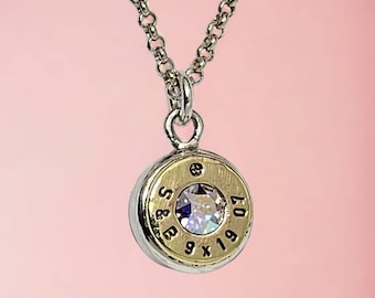 Sterling silver necklace with two sided 9mm ammo pendant and Cameleon Swarovski crystal