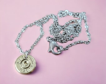 Necklace / pendant made with 9mm bullet / ammo (luger) casing.