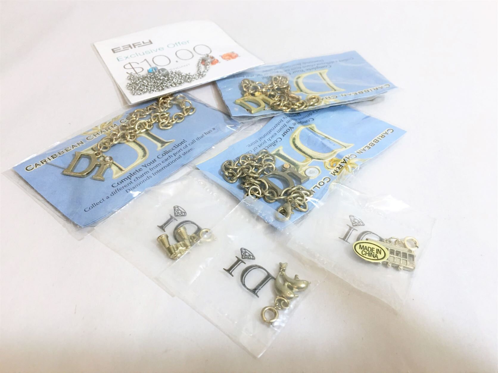 Diamonds international charms deals