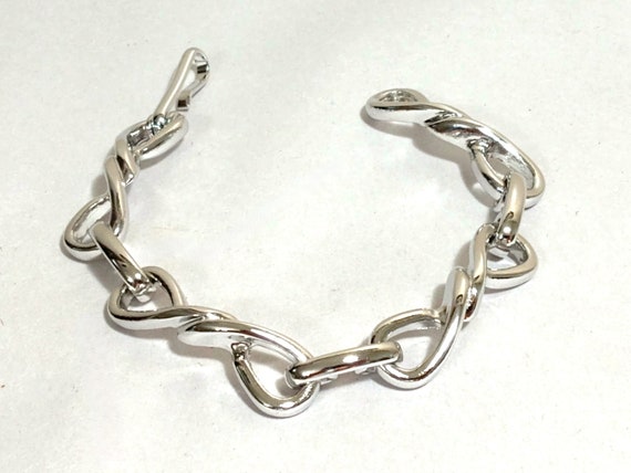 Avon silver bracelet deals