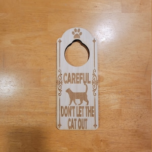 Don&#39;t Let The Cat Out Engraved Wooden Door Hanger Warning Sign