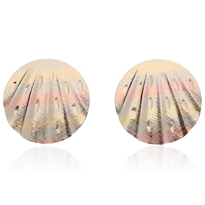 May include: A pair of round stud earrings. Each earring has a textured, fan-like design with gold, rose gold, and silver tones. The earrings are displayed on a white background.