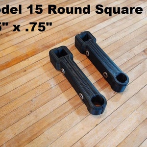 May include: Two black plastic round square model 15 pieces, each measuring 0.75" x 0.75".
