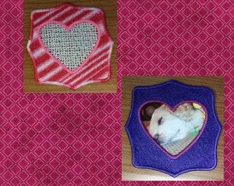 May include: Two free-standing lace heart designs. The first heart is red and white striped with a white lace heart inside. The second heart is purple with a pink lace heart inside. The text "Free Standing Lace Hearts #2" is below the hearts.