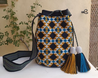 Wayuu mochila bag in single thread. Wayuu Traditional Design made in petrol blue and mustard yellow. Premium quality.