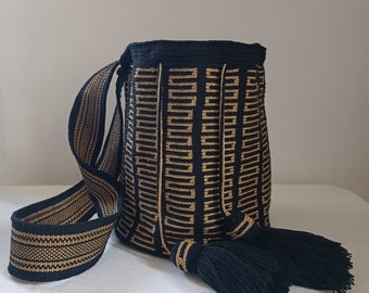 Wayùu mochila bag from Un Fil Unique, medium size, traditional Wayuu design in golden brown thread on a black background. Premium Quality