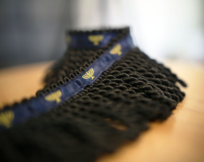 Featured listing image: Rare Premium Black Fringe With Navy Blue Ribbon and Menorah Print - israelite fringes for sale
