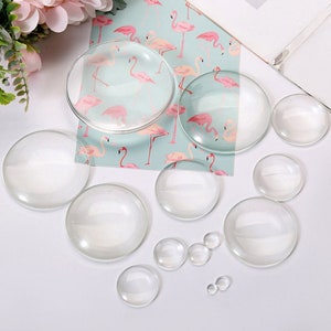 May include: Assortment of clear glass cabochons in various sizes, ideal for crafting and jewellery making.