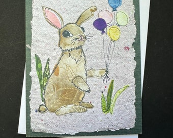 Bunny with balloons birthday card, “Hoppy Birthday”. Folded card printed from original art.  Sweet birthday card for child or rabbit lover.