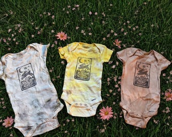 Hand dyed hand stamped natural fiber baby onesies! 3 colors available. Organic cotton, natural dyed and hand carved stamp of bunny
