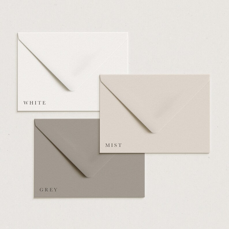 May include: Three envelopes in different colors: white, grey, and a light beige color called "mist".