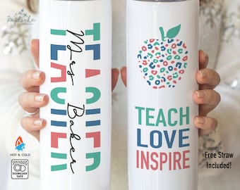 May include: Two white stainless steel tumblers with colorful designs. The tumbler on the left has the text "Teacher" written in colorful letters and the text "Mrs. Baker" written in black. The tumbler on the right has a colorful apple design and the text "Teach Love Inspire" written in colorful letters.