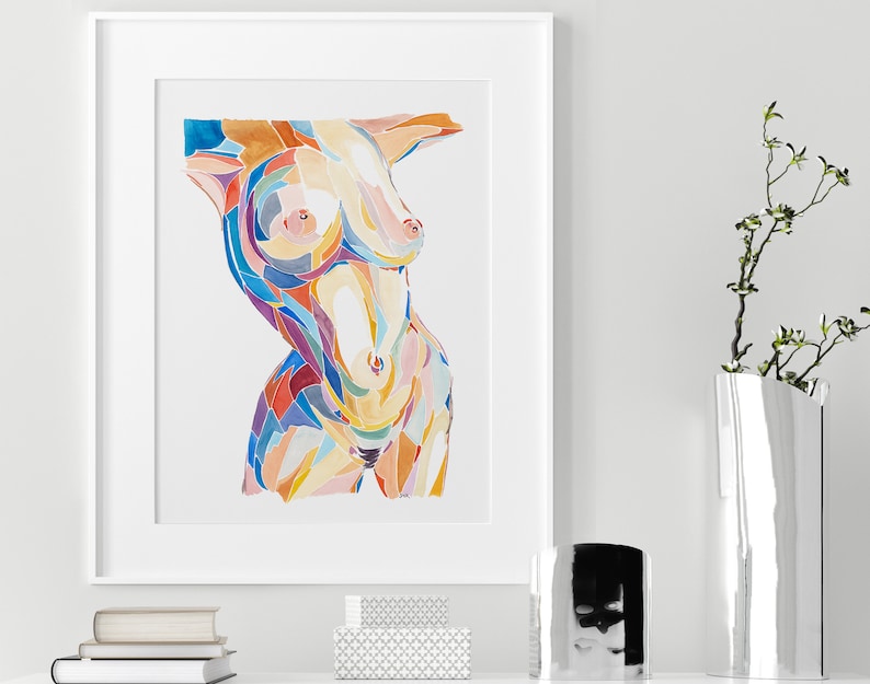 May include: A framed abstract watercolor painting of a torso with colorful geometric shapes. The painting is in shades of blue, yellow, orange, red, and pink.