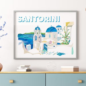 K&ouml;nnte beinhalten: Ein Aquarellbild eines wei&szlig;en Geb&auml;udes mit blauen Kuppeln in Santorini, Griechenland. Das Bild ist gerahmt und tr&auml;gt den Schriftzug "SANTORINI" in blauen Buchstaben oben.