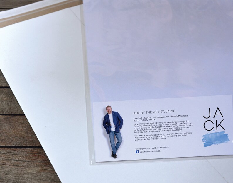 May include: A white card with a blue and white watercolor background. The card has text that reads "About the Artist, Jack" and includes a photo of the artist, Jack. The text describes Jack as a French Montrealer born in Brittany, France. The text also describes his paintings as being inspired by his life experiences, travels to Italy and the Caribbean, and his children's tales. The text states that the print is a reproduction of his original watercolor painting printed on professional acid-free quality paper using archival inks that will resist fading.