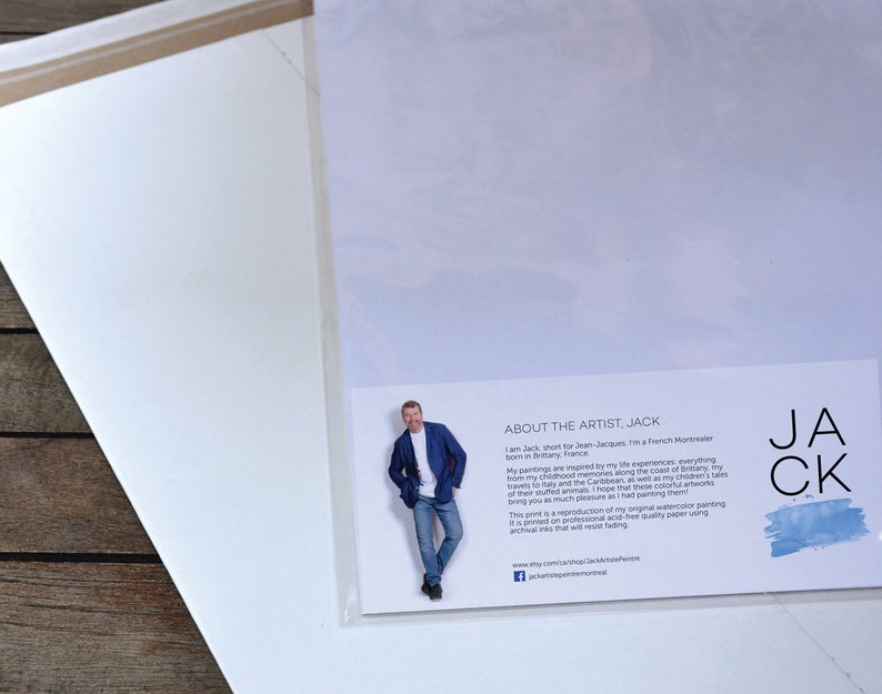 May include: A white card with a blue and white watercolour background. The card has text that reads "About the Artist, Jack" and includes a photo of the artist, Jack. The text describes Jack as a French Montrealer born in Brittany, France. The text also describes his paintings as being inspired by his life experiences, travels to Italy and the Caribbean, and his children's tales. The text states that the print is a reproduction of his original watercolour painting printed on professional acid-free quality paper using archival inks that will resist fading.