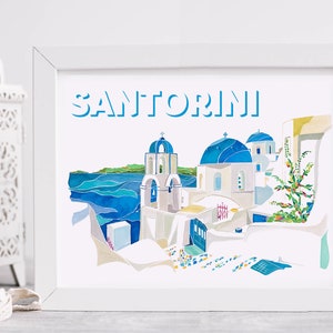 K&ouml;nnte beinhalten: Ein wei&szlig;er gerahmter Druck mit dem Wort "SANTORINI" in blauen Buchstaben. Der Druck zeigt eine Aquarellillustration eines wei&szlig;en Geb&auml;udes mit blauen Kuppeln und einem blauen Meer im Hintergrund.
