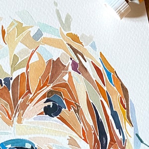 May include: Abstract watercolour painting of a dog's face in shades of brown, orange, blue, and white.