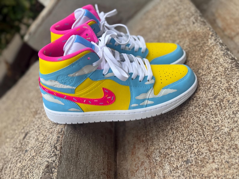 pink donut hand painted custom air Jordan 1 mid image 1