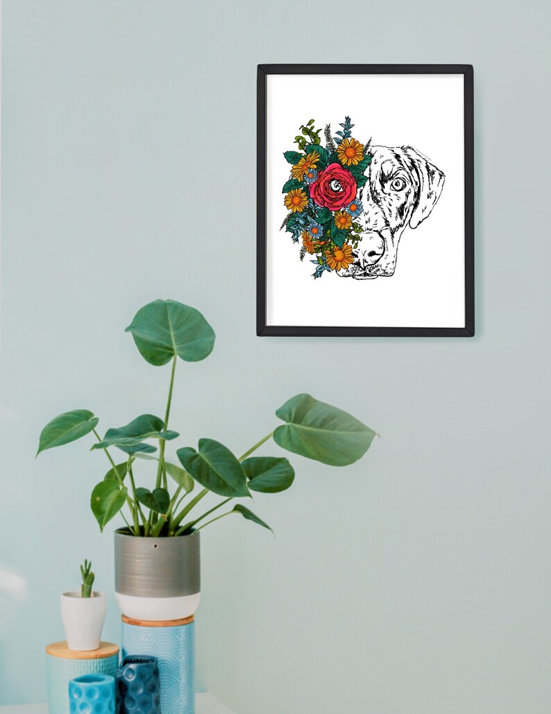 May include: Black and white line art illustration of a dog's head with colorful flowers covering one eye. The flowers are red, yellow, blue, and green.
