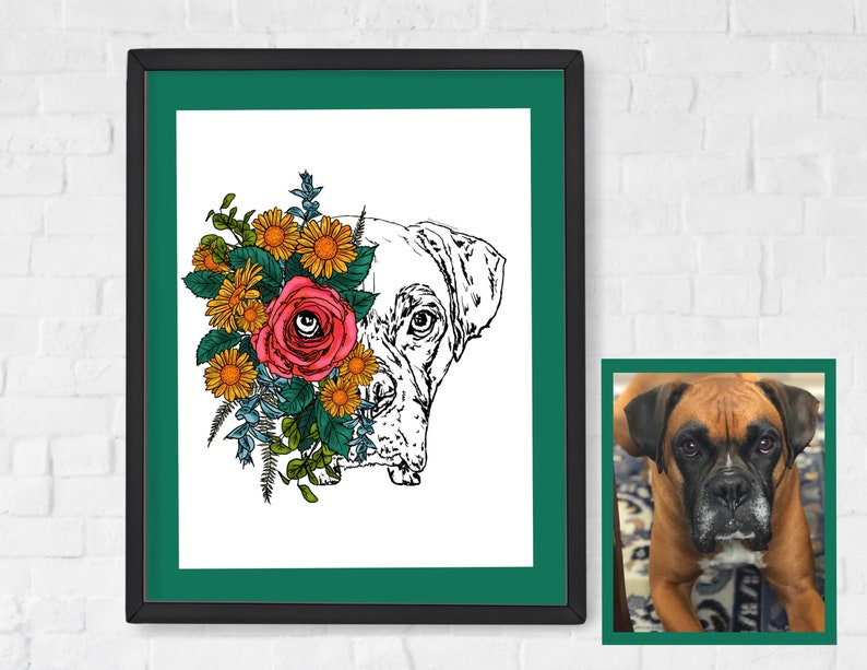 May include: A black and white line drawing of a boxer dog's head with a large pink rose and yellow flowers covering one eye. The drawing is framed in a black frame with a green mat.